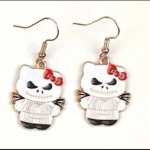 C1. Hello Kitty, jack Skellington earrings nbc